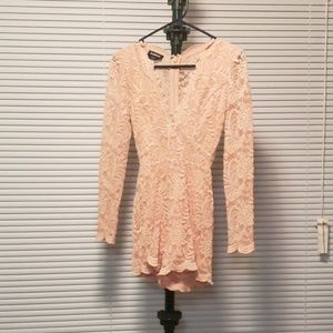 Bebe long-sleeved lace romper